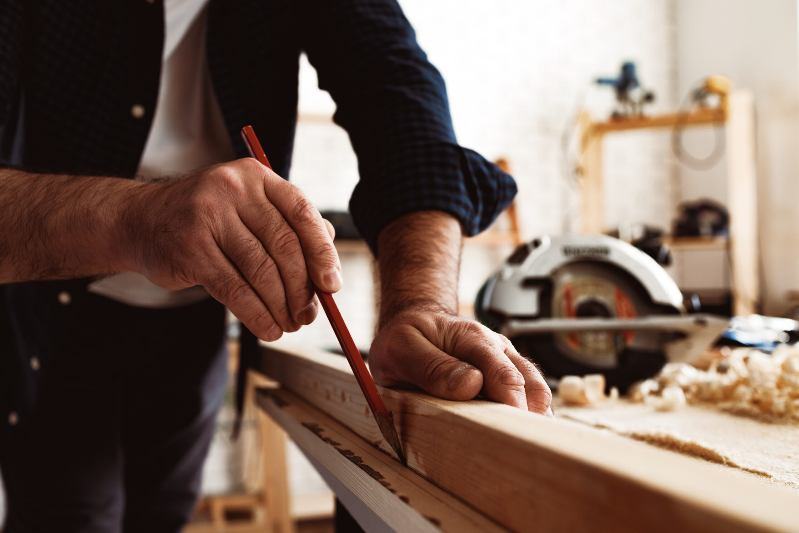 Finishing carpenter marking timber